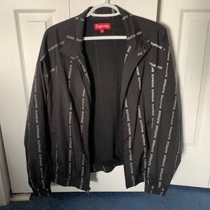 Men’s Supreme size medium black reflective wind breaker.